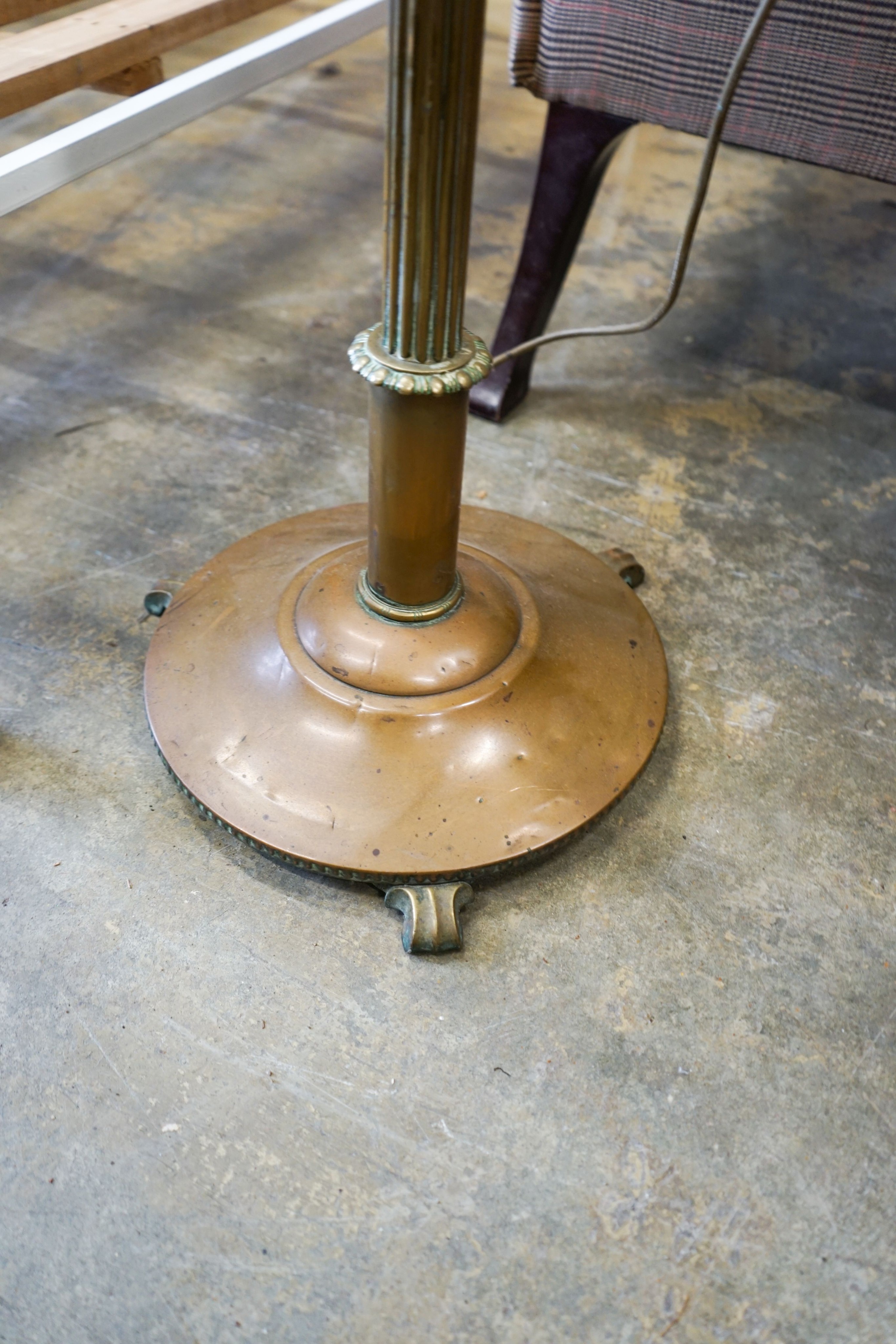 Two early 20th century copper and brass standard lamps, larger height 169cm